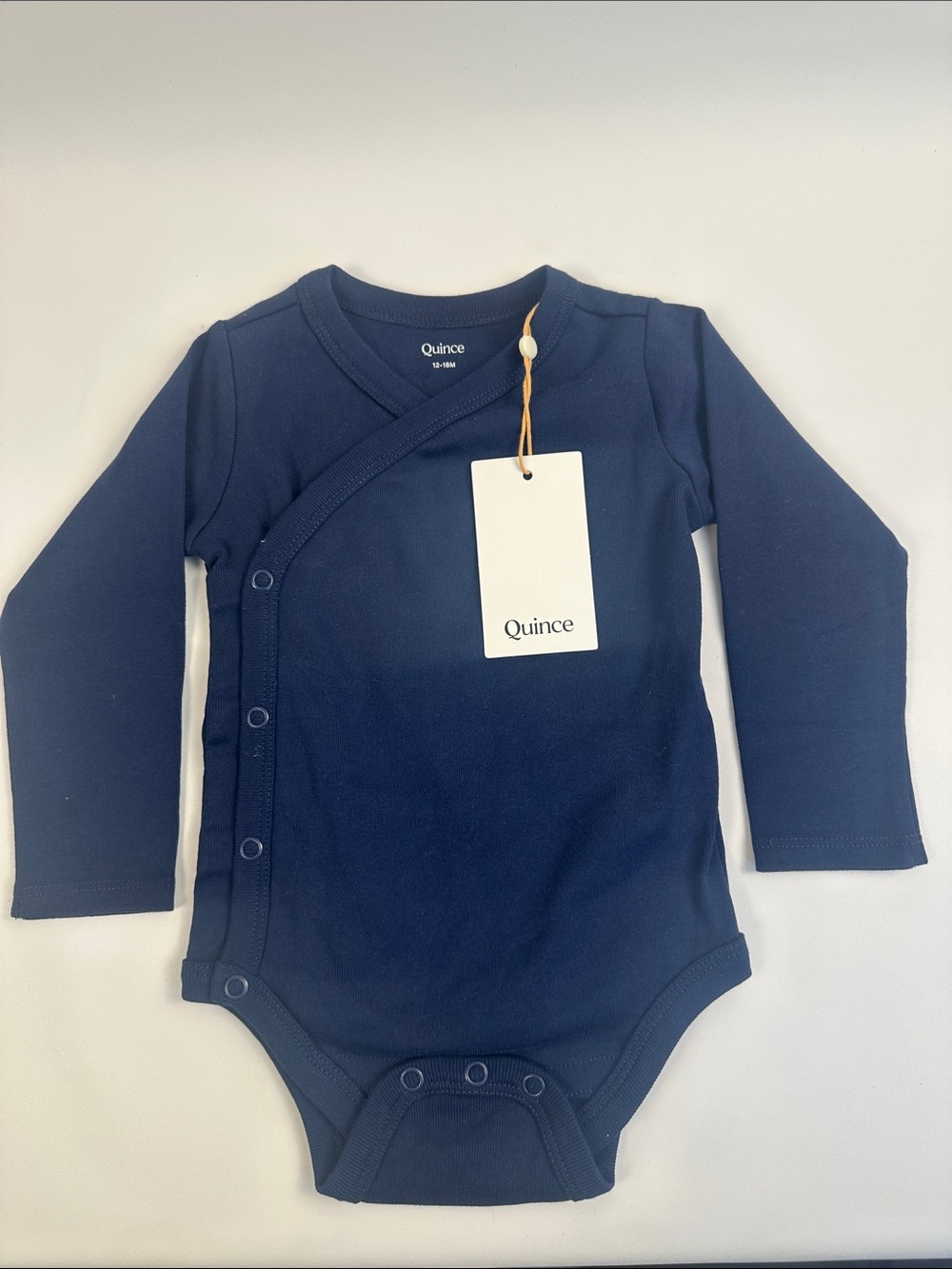 Quince Navy Long-Sleeve Wrap Baby One-Piece
B119